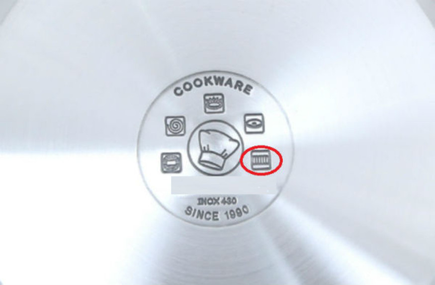 Biểu tượng lò xo cho biết sản phẩm có thể dùng trên bếp từ